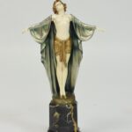 Exceptional bronze and ivory figurine