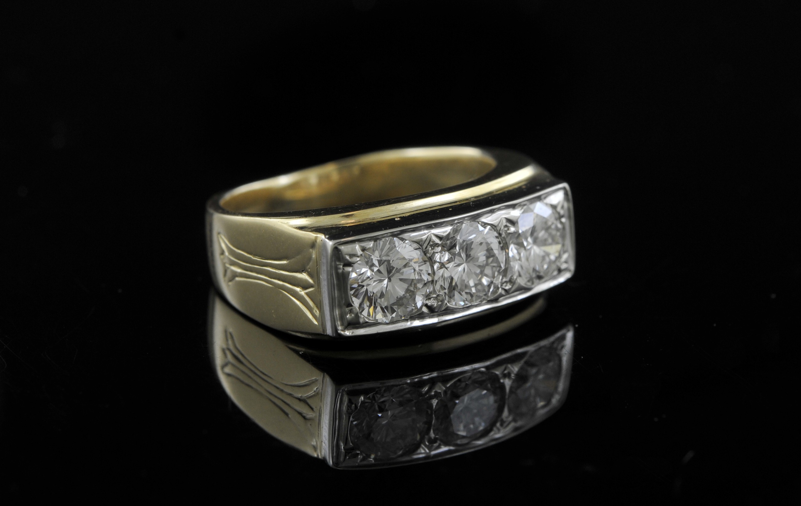 Fine 18k yellow gold three stone diamond man's ring