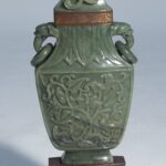 Large Chinese jade urn converted to lamp with carved handles
